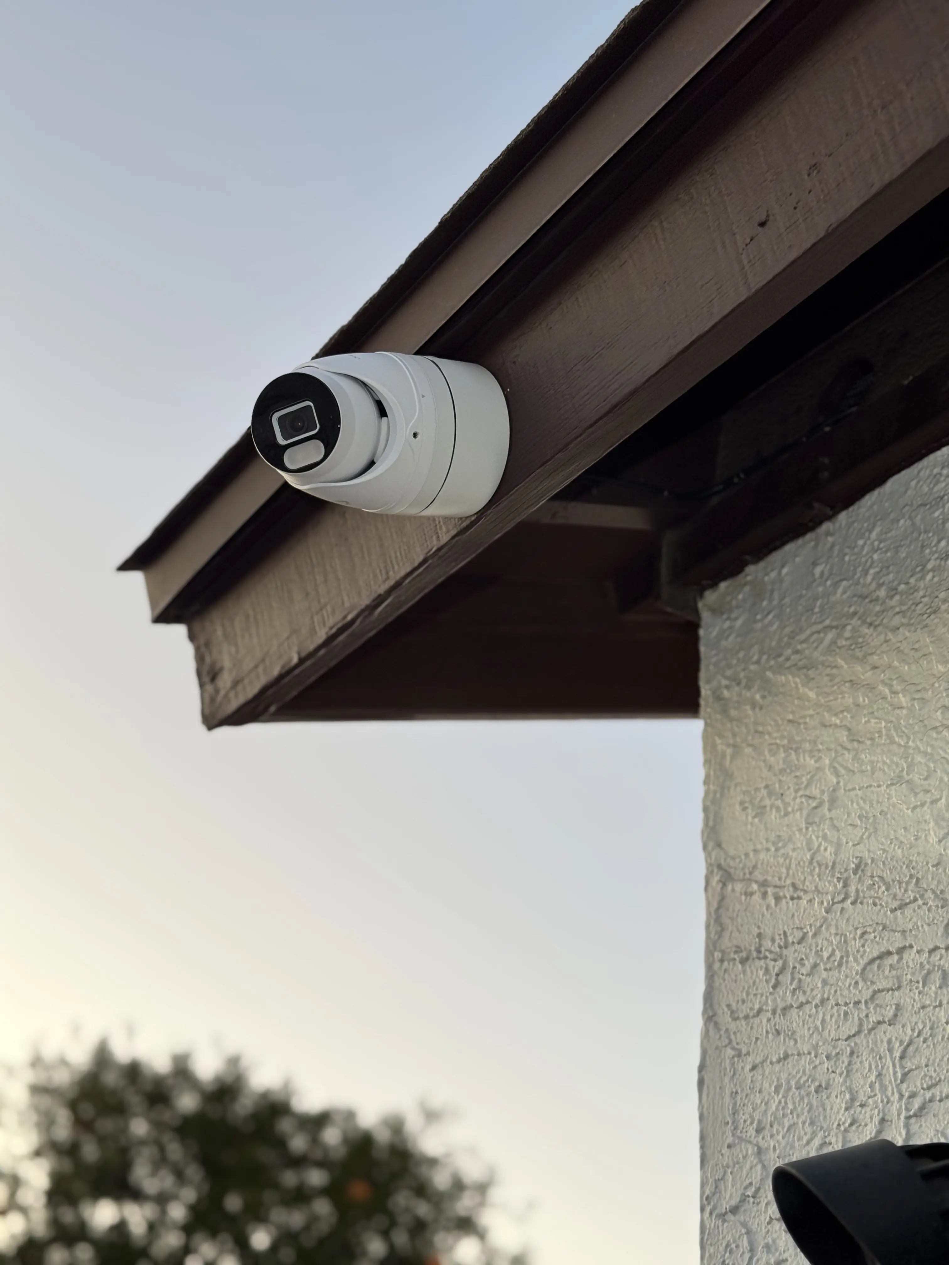 Professional security system installation with wires and cables
